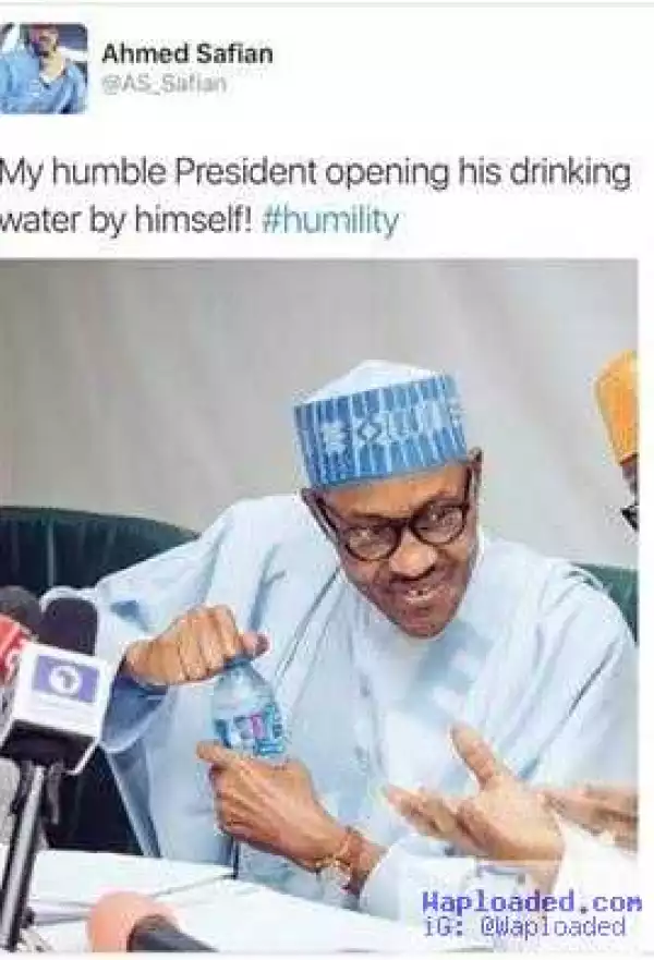 Normal? See what President Buhari was caught doing [See Photo]